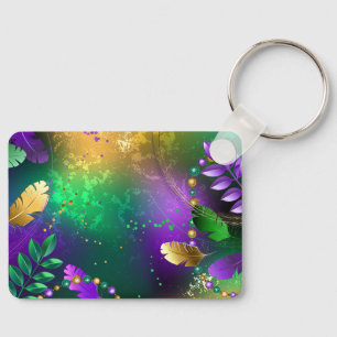 Iridescent mardi gras background with beads keychain