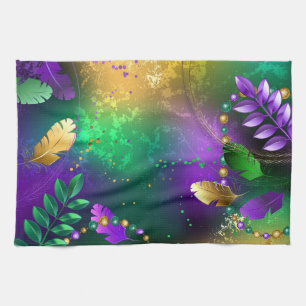 Iridescent mardi gras background with beads kitchen towel