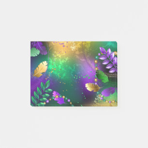 Iridescent mardi gras background with beads post-it notes