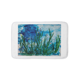Iris sur tapis de bain de bord de l'eau le petit