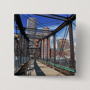 Iron footbridge with Boston Financial district 2 Inch Square Button