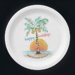 Island Holiday Tropical Beach Palm Christmas Paper Plate<br><div class="desc">Tropical beach theme Christmas paper plates feature a watercolor island in the sun with a palm tree decorated with string lights and ornaments,  and a  "happy holidays" greeting. The lower line of text can be personalized (shown here with "thanks for celebrating with us"). Art by KL Stock</div>