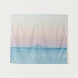 Island silhouette on horizon at sunset tapestry
