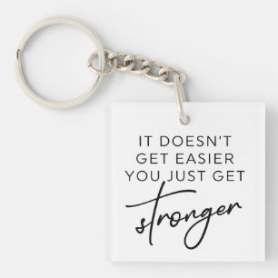 It Doesn't Get Easier You Just Get Stronger  Keychain