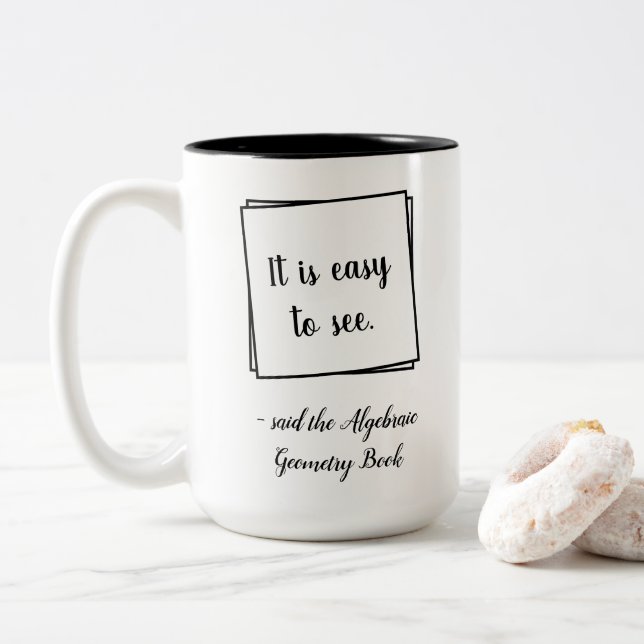 It is easy to see, says the Mathematics Book Funny Two-Tone Coffee Mug (With Donut)