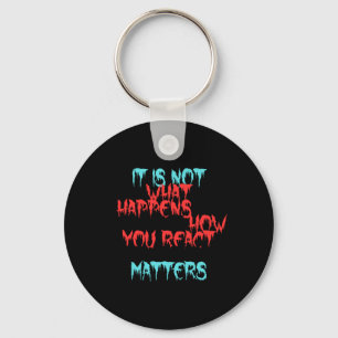 It Is Not What Happens To You Keychain