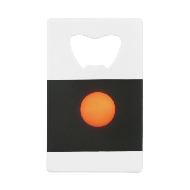 it is the sun credit card bottle opener (Front)
