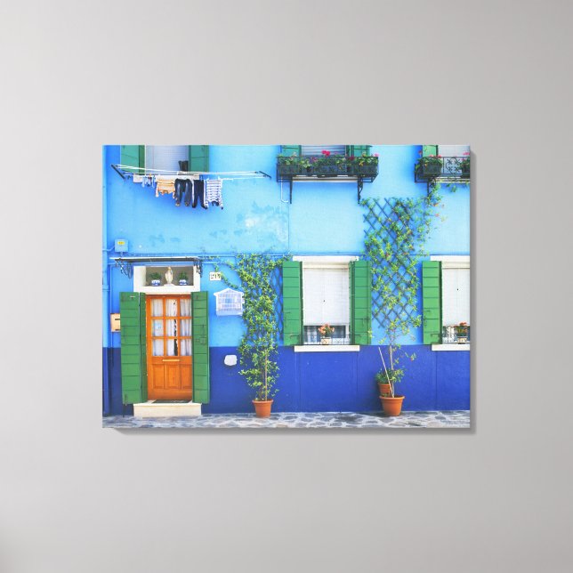 Italy, Burano. A colourful house in Burano near Canvas Print (Front)