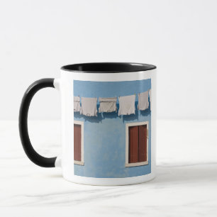 Italy, Burano. Hanging laundry and windows along Mug