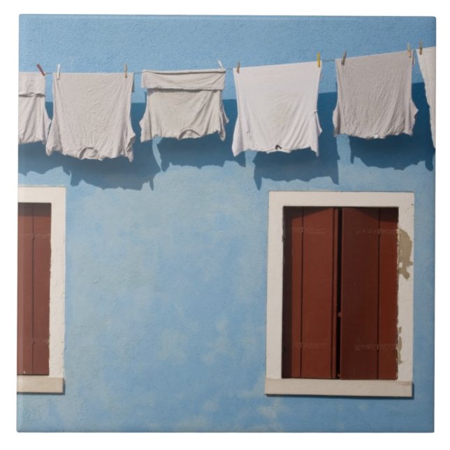 Italy, Burano. Hanging laundry and windows along Tile (Front)