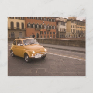 Italy, Florence. Fiat 800 Rally crosses Arno Postcard