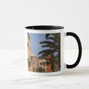 Italy, Sardinia, Cagliari. Buildings and palms Mug