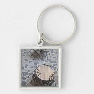 Italy, Sardinia, Castelsardo. Cafe tables. Keychain