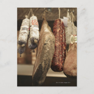 Italy,Tuscany,Pienza,Selection of local ham and Postcard