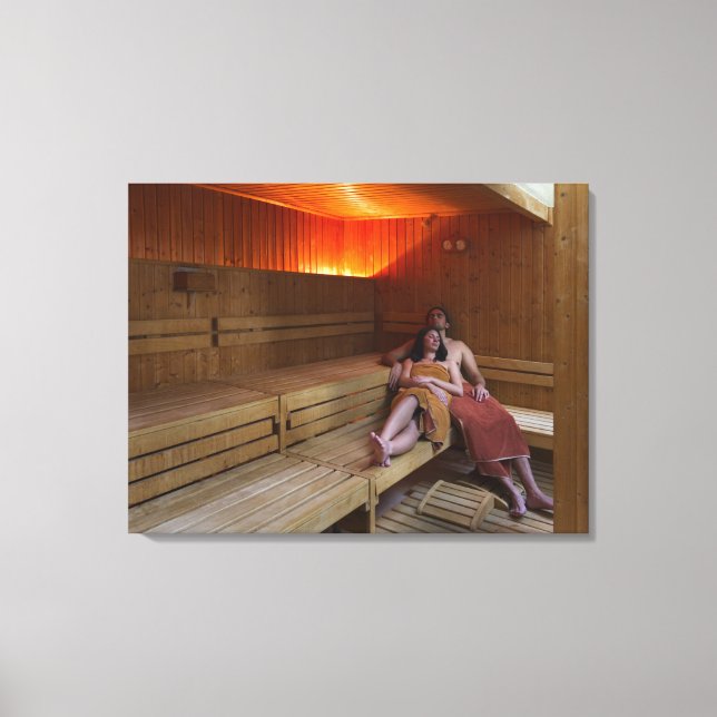 Italy, Tuscany, Young couple relaxing in sauna Canvas Print (Front)