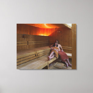 Italy, Tuscany, Young couple relaxing in sauna Canvas Print