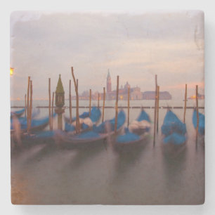 Italy, Venice. Anchored gondolas at twilight. Stone Coaster