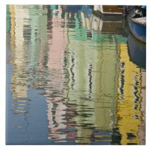 Italy, Venice, Burano. Multicolored houses along Tile