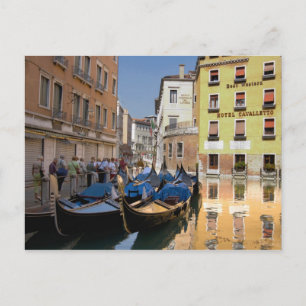 Italy, Venice, gondolas moored along canal Postcard
