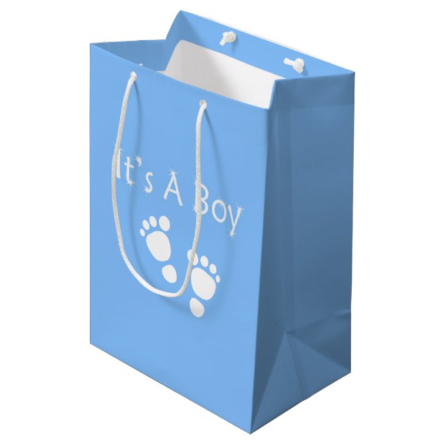 It's a boy with blue baby-feet and white dots medium gift bag (Front Angled)