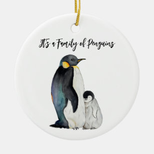 It's a family of penguins watercolor drawing ceramic ornament