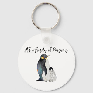 It's a family of penguins watercolor drawing keychain