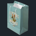 It's a Festivus Miracle Medium Gift Bag<br><div class="desc">Gather 'round the aluminum pole and celebrate the most unexpected moments of the season with this "It's a Festivus Miracle!" graphic. Featuring the legendary Frank Costanza in his peak holiday form, this design captures the hilarious energy of the Seinfeld holiday we all know and love. With its retro sunburst background...</div>