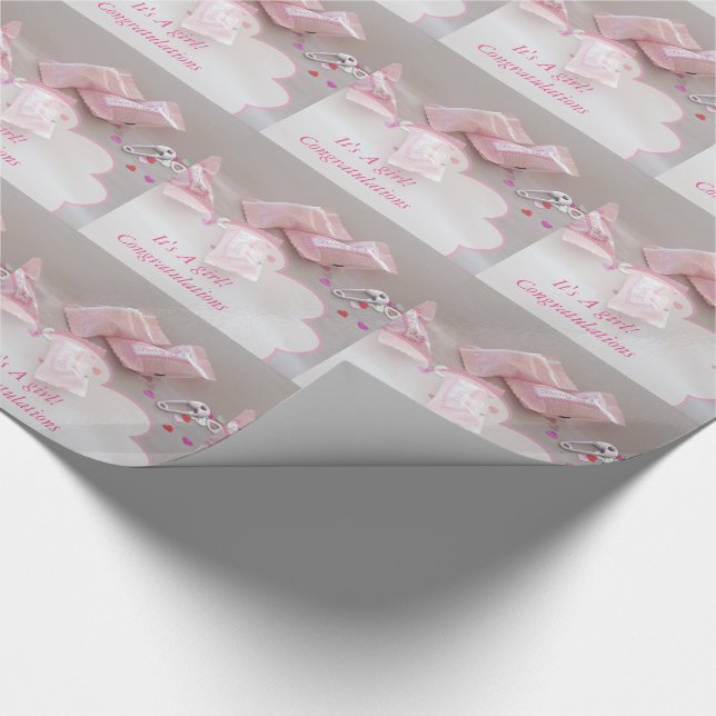 It's a girl baby shower candy safety pin wrapping paper (Corner)