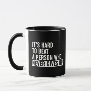 It's Hard To Beat A Person Who Never Gives Up Mug