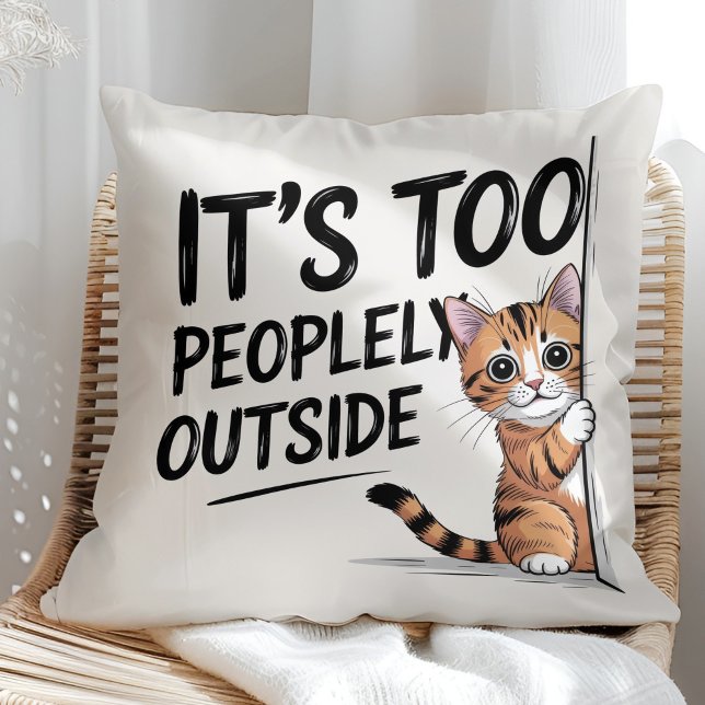 "It's Too Peopely Outside" Funny Introvert Cat Throw Pillow ("It's Too Peopely Outside" Funny Introvert Cat Throw Pillow in a sunny boho rattan chair.)