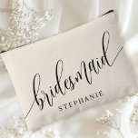 Ivory Cream Bridesmaid Modern Calligraphy Accessory Pouch<br><div class="desc">Celebrate your bridal party with this elegant ivory cream bridesmaid accessory pouch. Featuring modern calligraphy and customizable with your bridesmaid's name, this pouch is both stylish and practical. The soft dusty sage colour and elegant script create a sophisticated look, perfect for holding makeup, toiletries, or other essentials. This personalized pouch...</div>