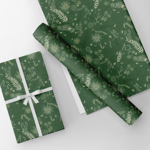 Ivory floral doodles on green wrapping paper sheet