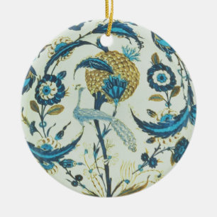 Iznik dish painted with a peacock perched among fl ceramic ornament