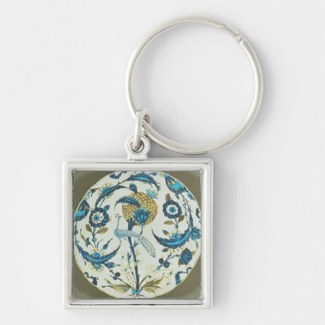 Iznik dish painted with a peacock perched among fl keychain (Front)