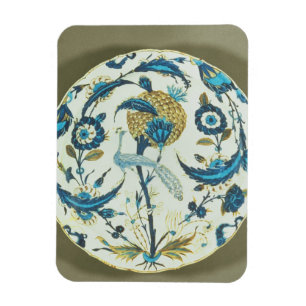 Iznik dish painted with a peacock perched among fl magnet