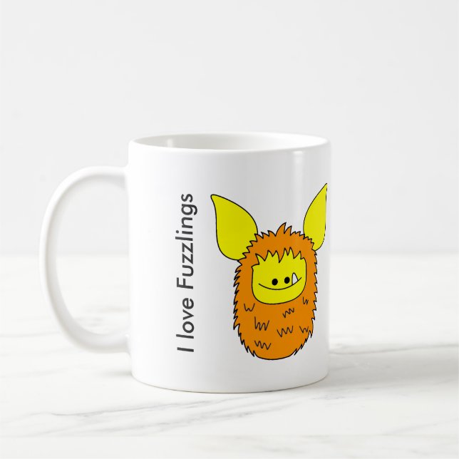 J'aime Fuzzling orange/jaune de tasse de Fuzzlings (Gauche)