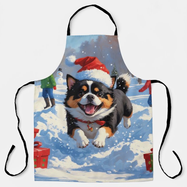 Japanese Chin Running in Snow with Christmas Hat Apron (Front)