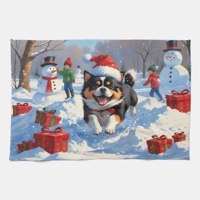 Japanese Chin Running in Snow with Christmas Hat Kitchen Towel (Horizontal)