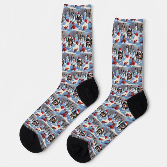 Japanese Chin Running in Snow with Christmas Hat Socks (Left)