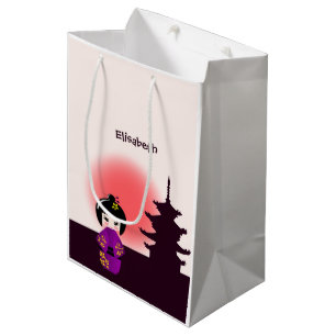Japanese kokeshi doll at temple during sunset girl medium gift bag