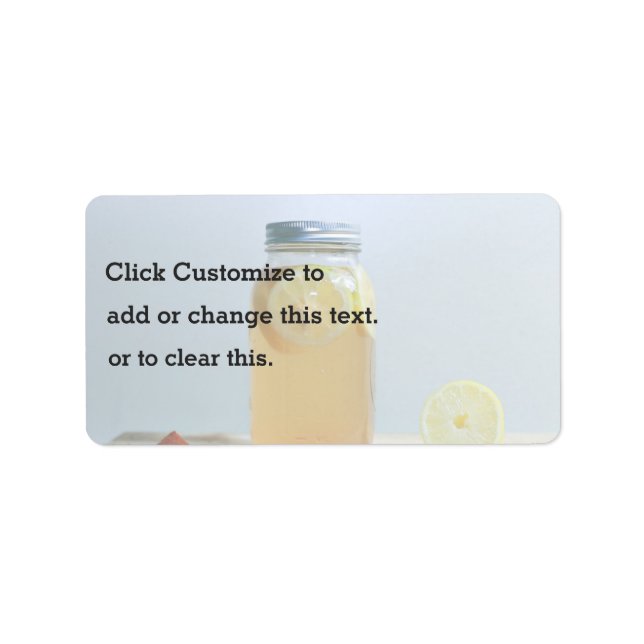 Jar with metal lid filled with lemons and water label (Front)