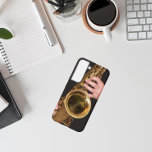 Jazzman Playing Gold Saxophone Samsung Galaxy Case<br><div class="desc">For music lovers! Protect your Samsung Galaxy S22 phone with this durable phone case that features the photo image of a jazzman playing his time-worn,  gold coloured,  tenor saxophone horn. Select your phone style.</div>