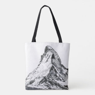 Je déplace le sac fourre-tout à montagnes