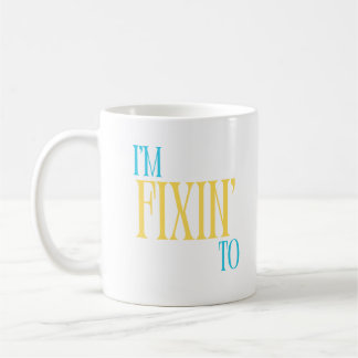 Je me fixe au sud de la tasse en bleu et jaune