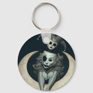 Jester sits on crescent moon wireless charger  keychain