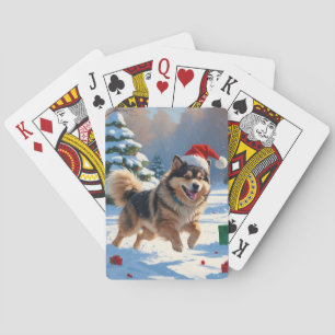 Jeu De Cartes Lapphund finnois courant dans la neige avec un cha