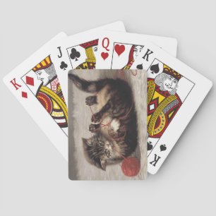 Jeu De Cartes Le berceau de chat, un chat qui joue à la balle de