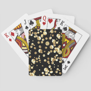 Jeu De Cartes Pois or sur un arrière - plan noir.