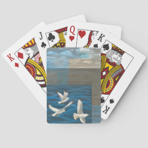 Jeu De Cartes Trois mouettes blanches volent au-dessus de l'eau