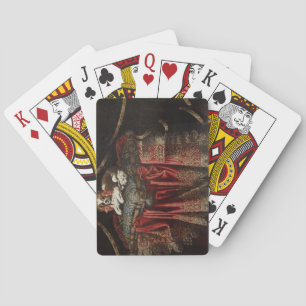 Jeu De Cartes Un épagneul assis sur un coussin brodé
